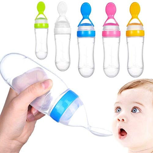 Baby feeding bottle with spoon