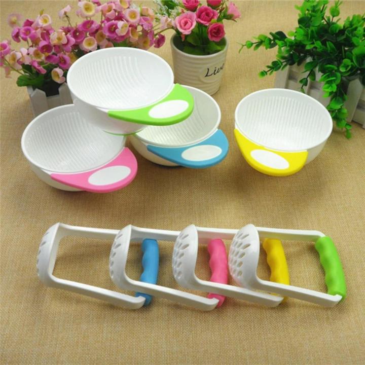 Baby feeding bowl with masher